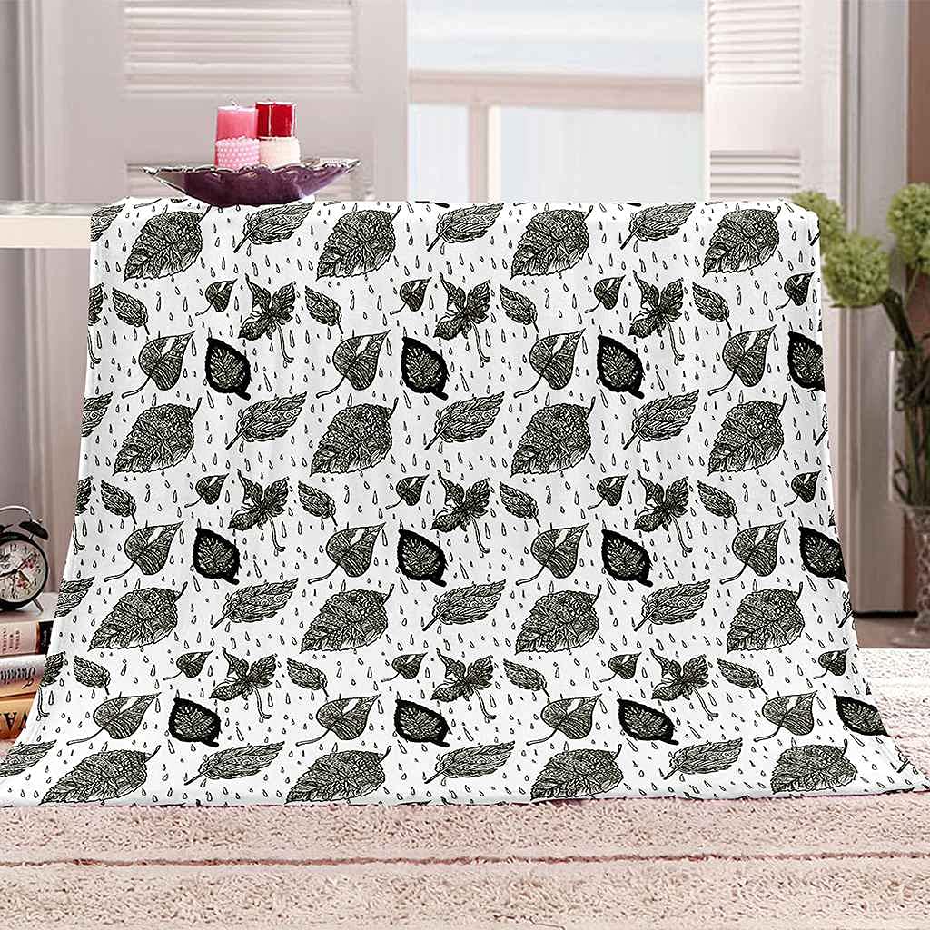 Couverture polaire microfibre grise anti-bouloche 150x200 lavable machine impression feuilles