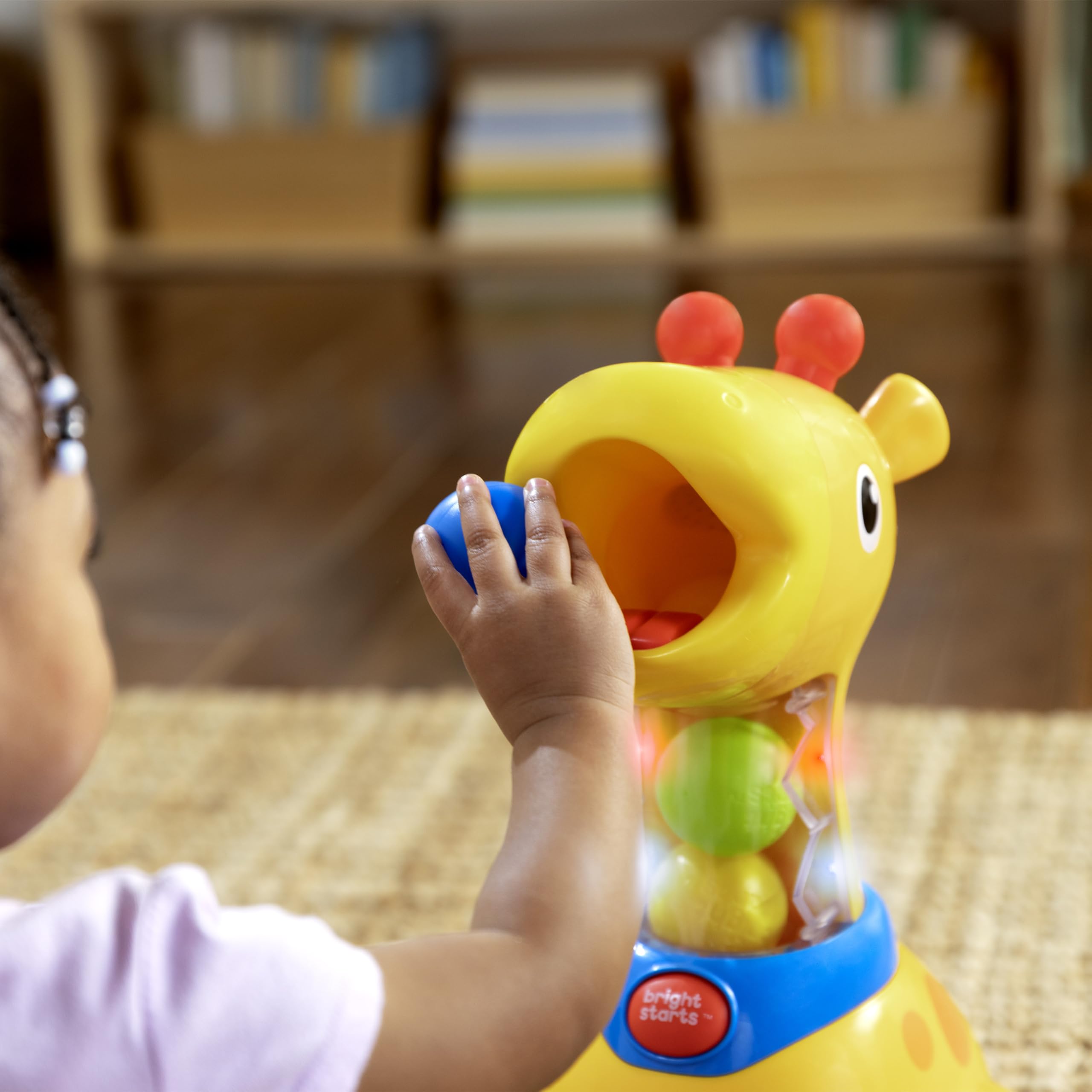 Bright Starts Zabawka Spinnin' Spots Giraffe Ball Play dla umiejętności motorycznych i skutków przyczynowych, +6 miesięcy, unisex, piłka do raczkowania i ścigania - wielokolorowa