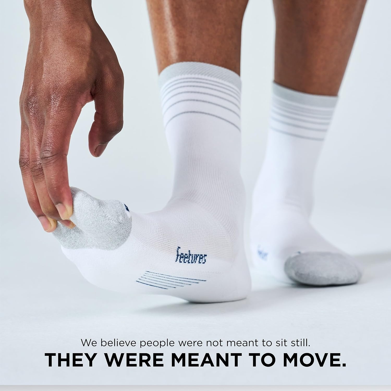 Feetures Elite Light Cushion Mini Crew Sock - Sport Sock with Targeted Compression