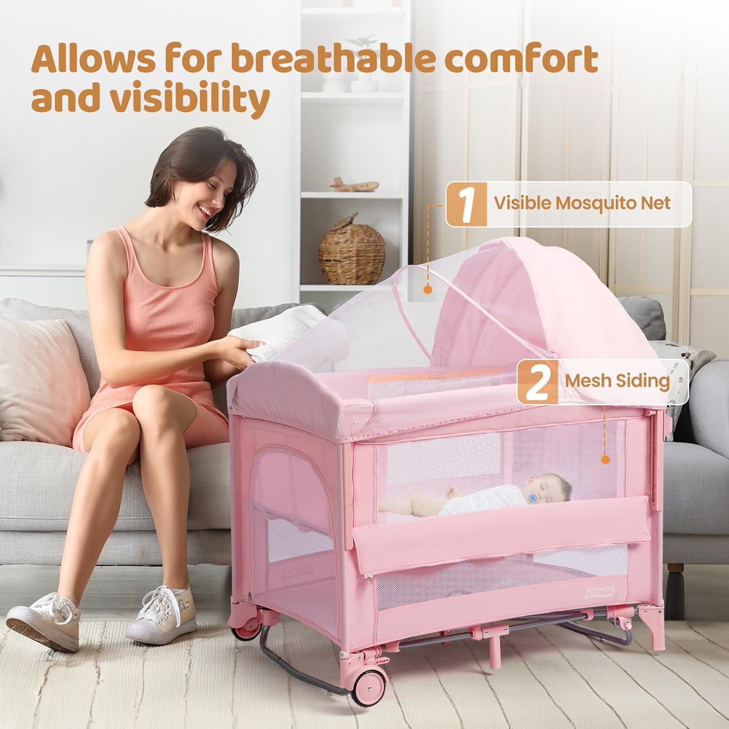 The JOYMOR bassinet configured as a rocking bassinet, showing the curved base for gentle motion.