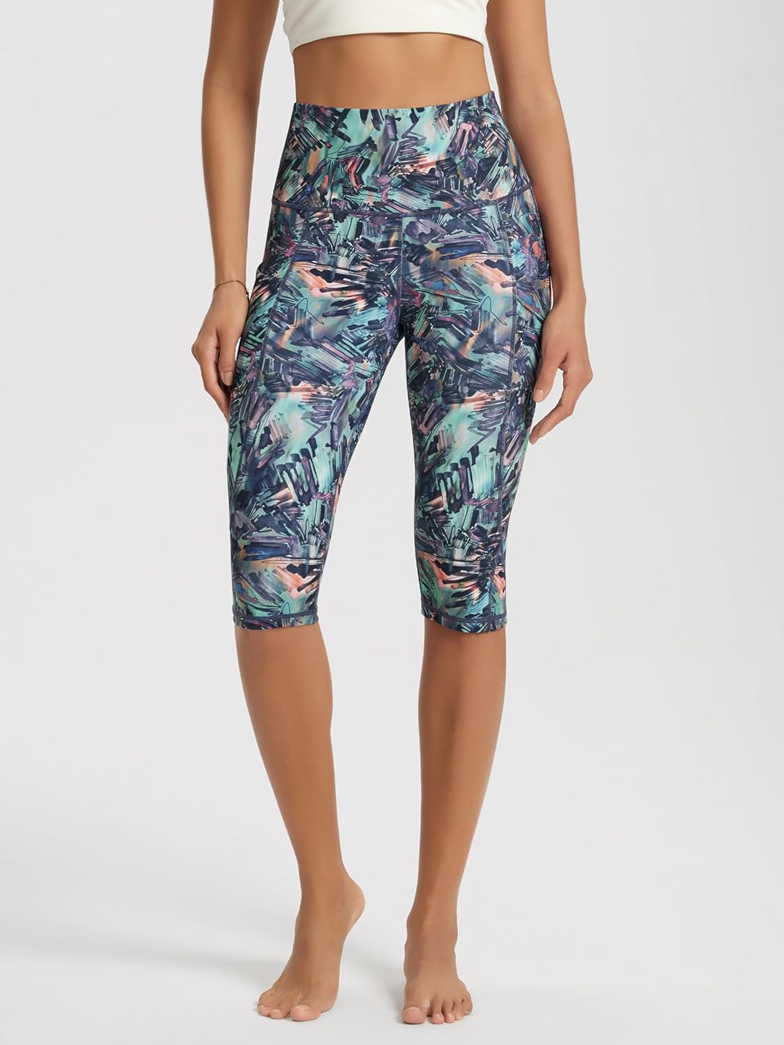 ODODOS Women's High Waisted Yoga Capris with Pockets, Tummy Control Non See Through Workout Athletic Running Capri Leggings - Image 4