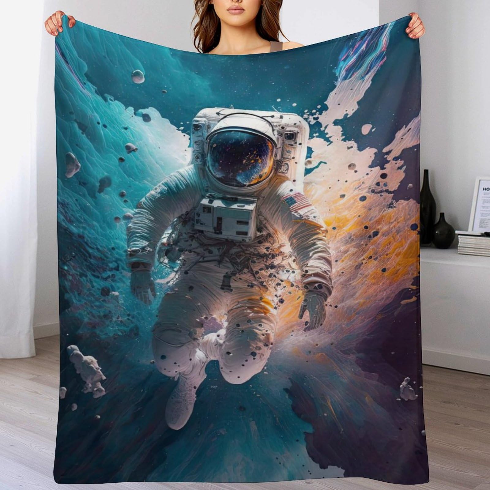 Couverture polaire astronaute : finis les frissons sur le canapé grâce à la flanelle douce