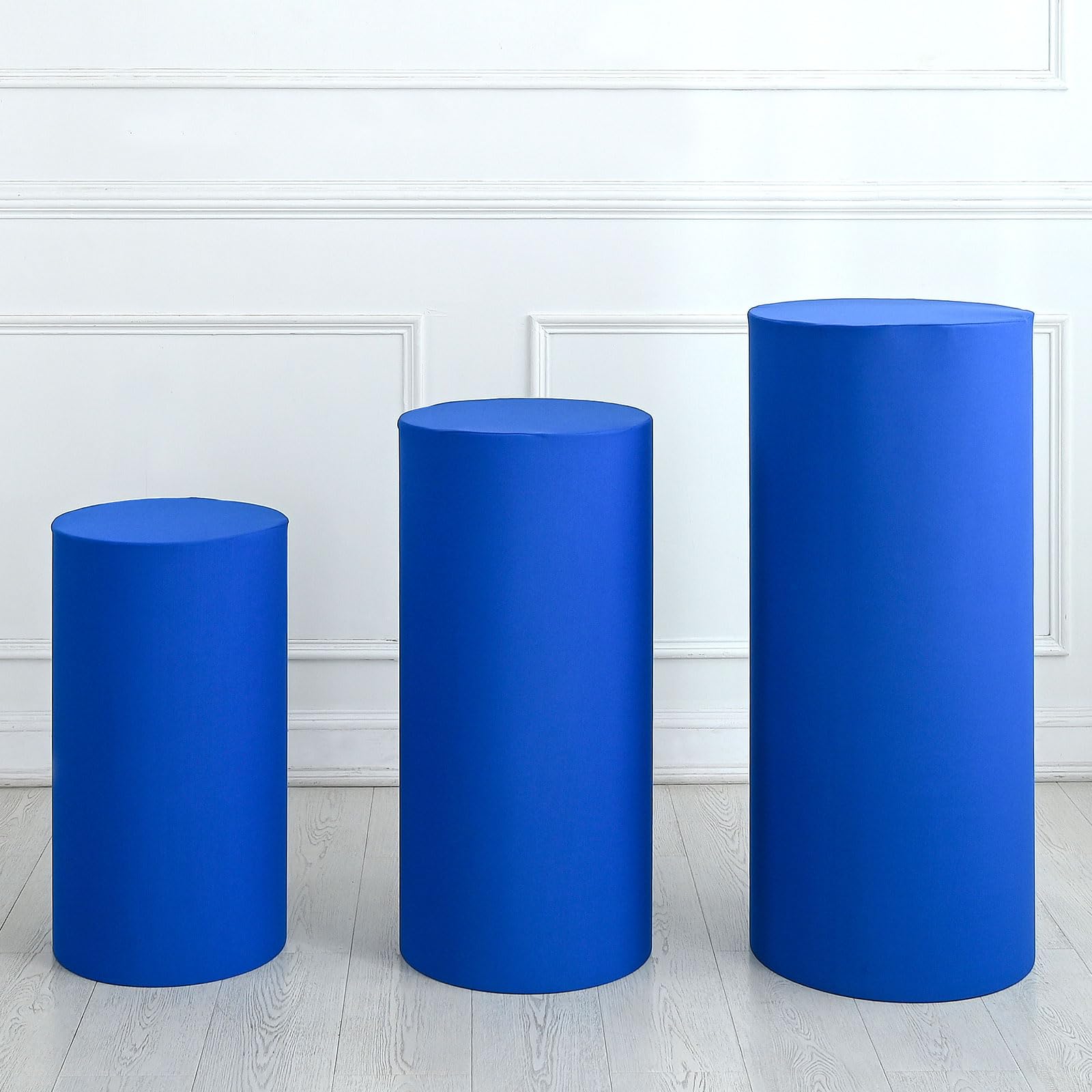 Fundas cilíndricas azul oscuro cubiertas de tela elástica para decoración de fiestas