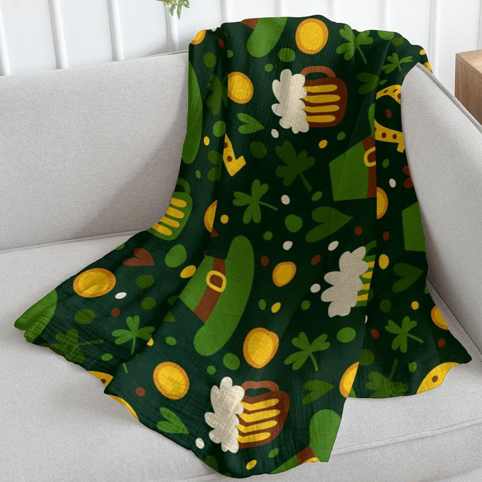 Coperta in pile con motivo verde per divano, divano o letto