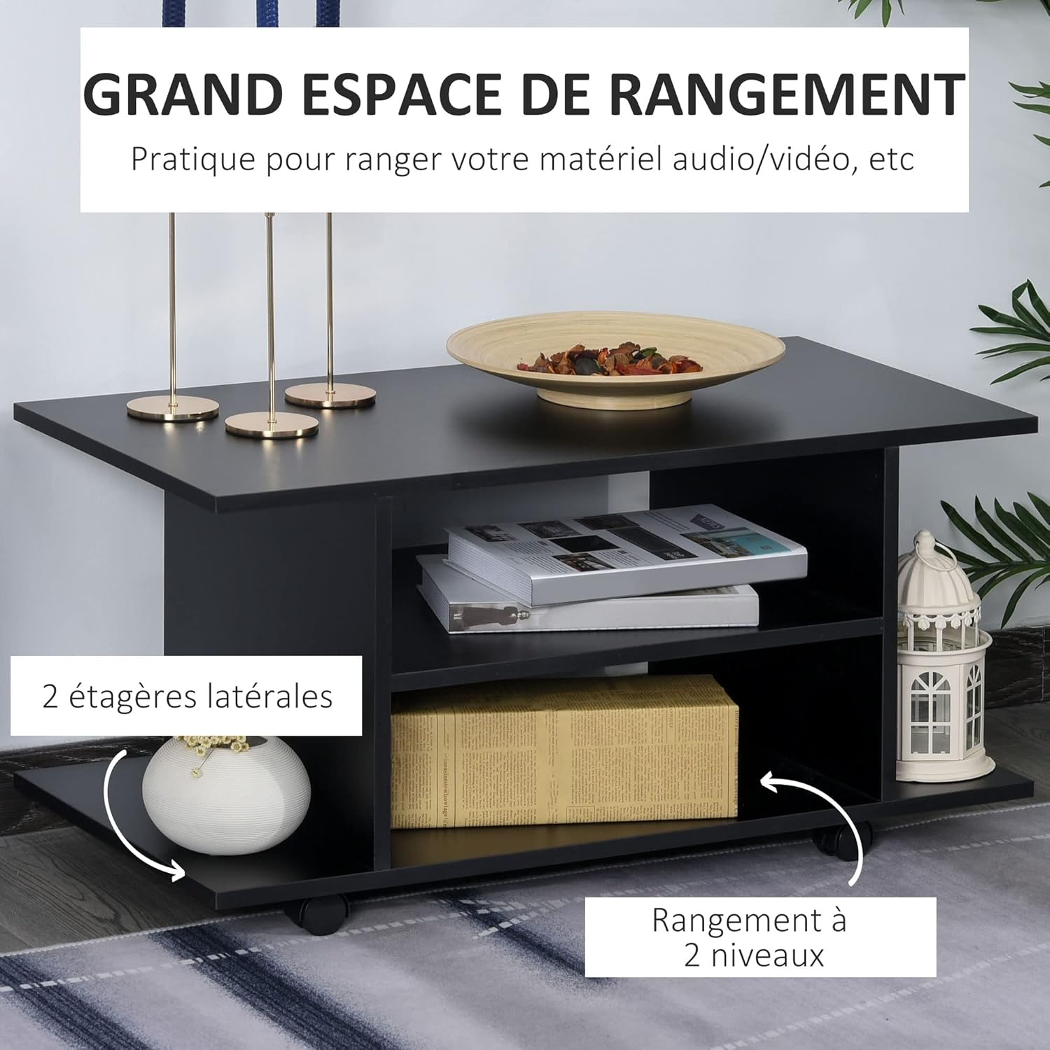 Close-up of the TV stand's storage compartments with books and decorative items