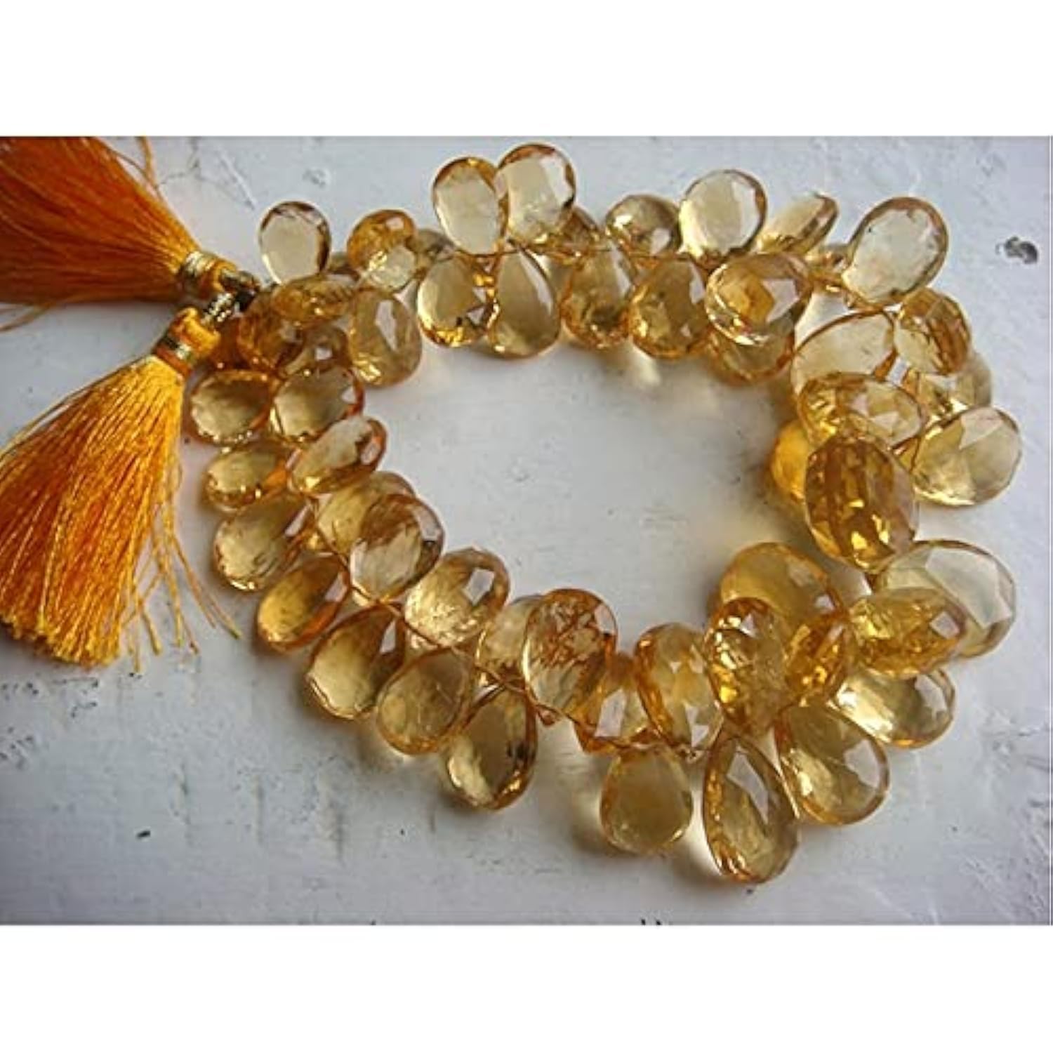 Citrine naturelle briolettes poire LKBEADS pour créer des bijoux d'été lumineux