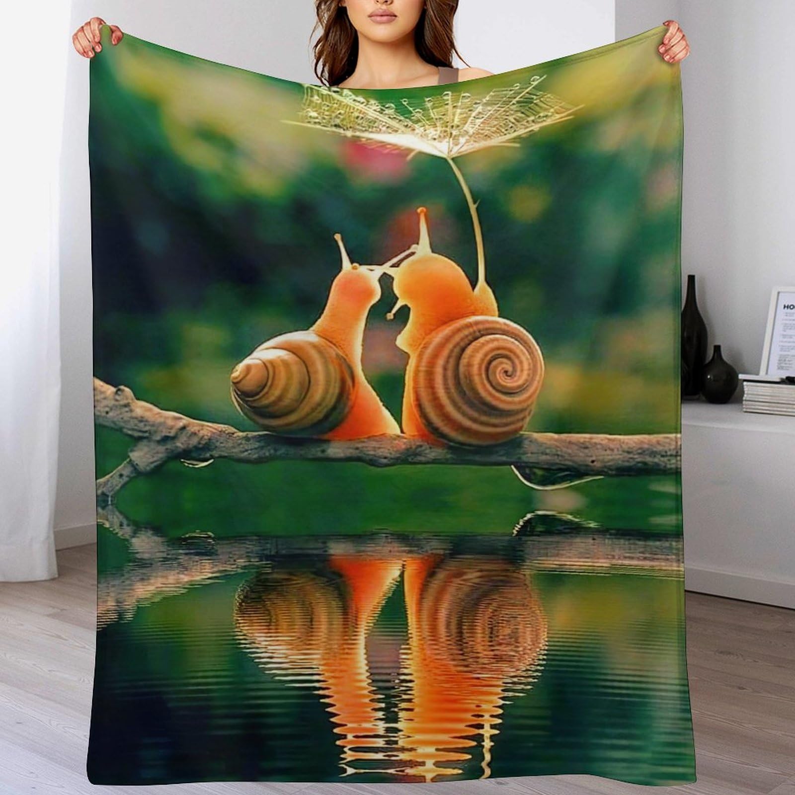 Couverture polaire escargots flannel douce : fini les nuits froides