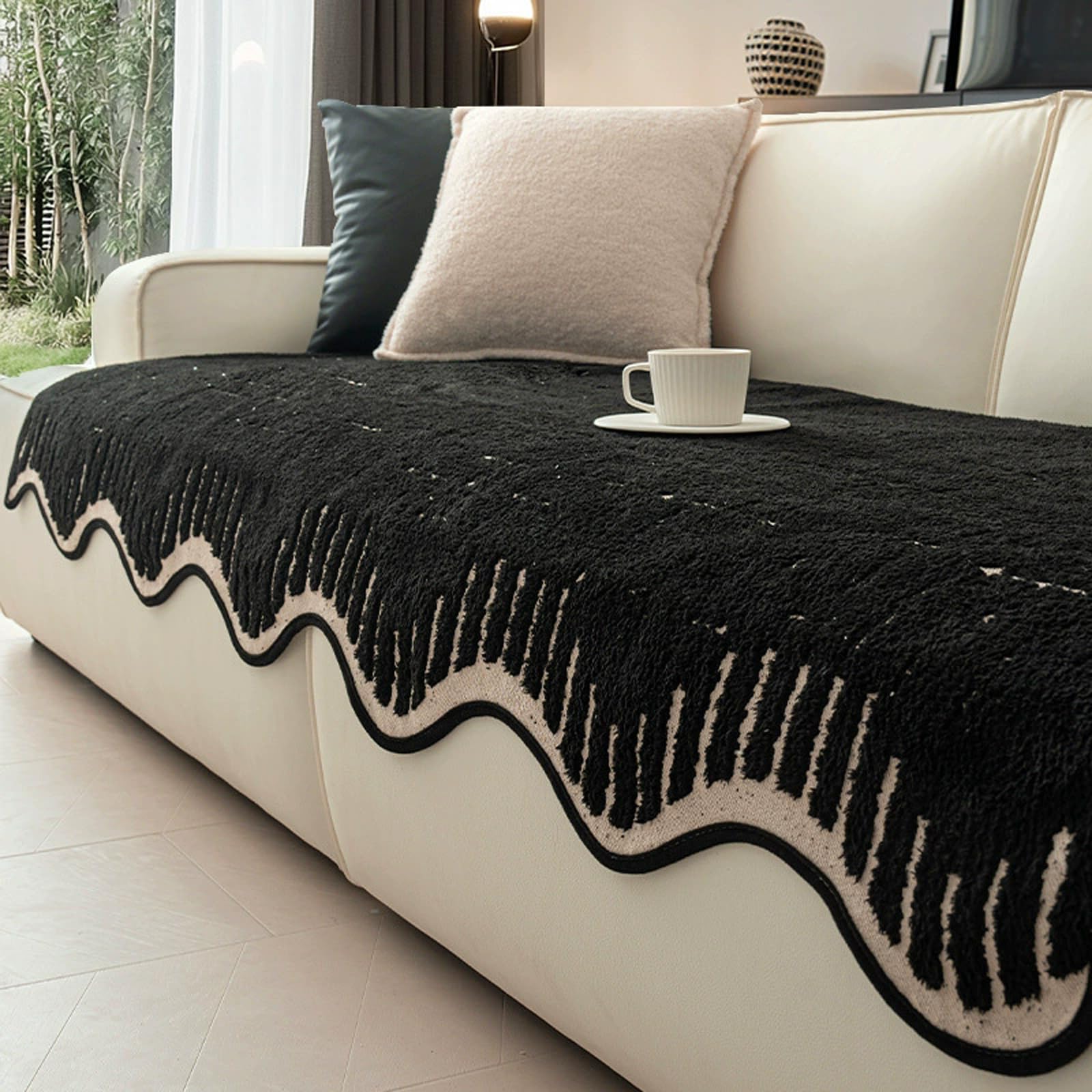 Housse de canapé imperméable noire pour savourer vos moments en famille