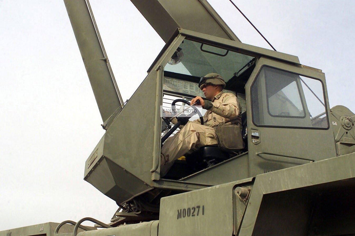 Photo Using a Heavy Equipment crane, a US Marine Corps