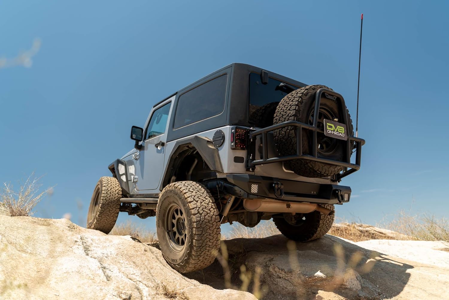 Body Mounted Tire Carrier for 2007-2018 Jeep Wrangler JK | Improves Departure Angle | Transfers Weight from The Door Hinges to The Vehicle Body | LED License Plate Light | 2 Whip Flag/Antenna Mounts