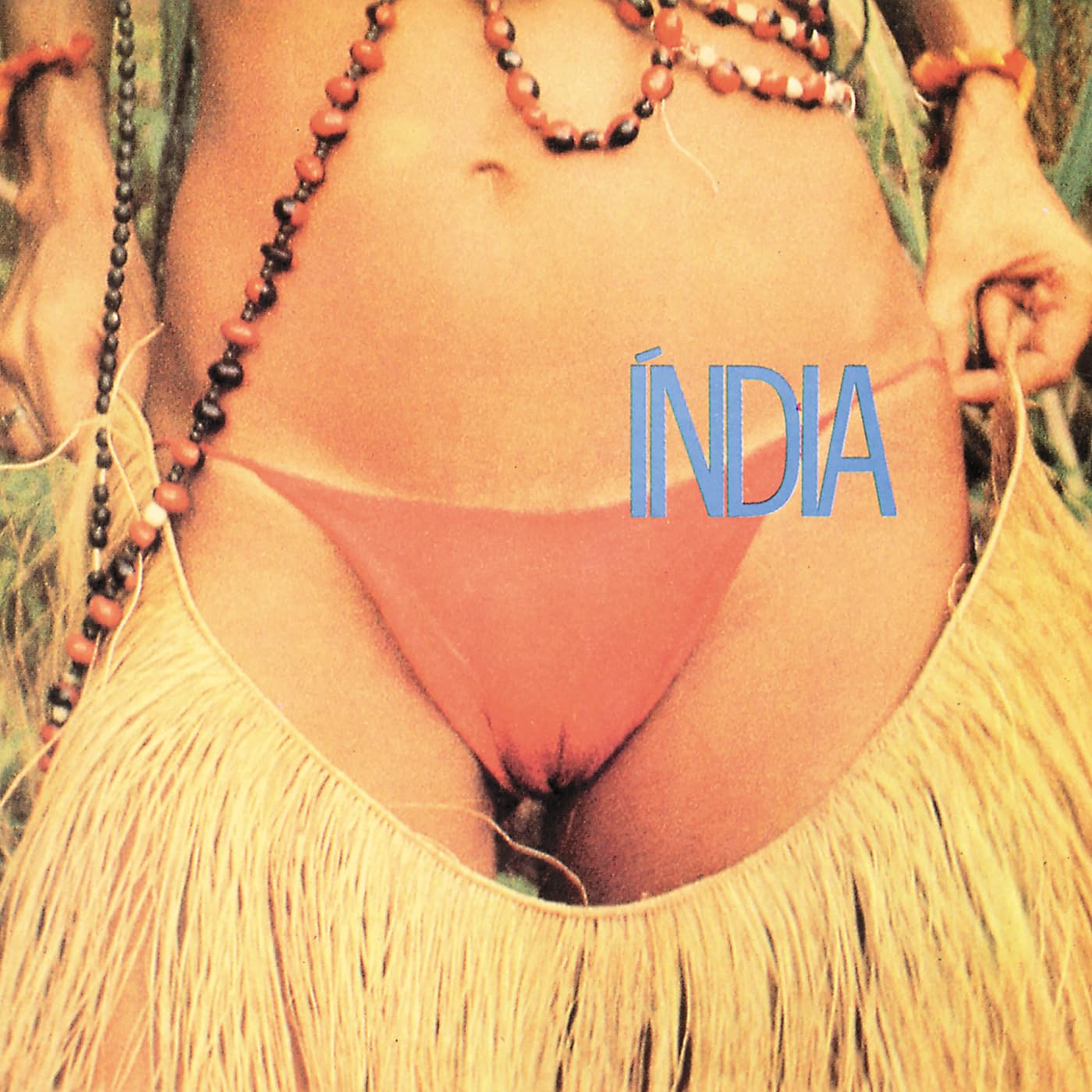 Gal Costa album cover, depicting Gal Costa semi-nude with indigenous vests and, in all-caps blue text, the album title: "ÍNDIA"