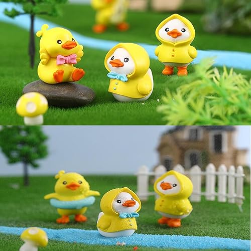Miniatura 5 de 6 mini figuras de pato amarillo con impermeable, guitarra y anillo de natación de 1 pulgada, hongos de pato en miniatura, decoración de pasteles,