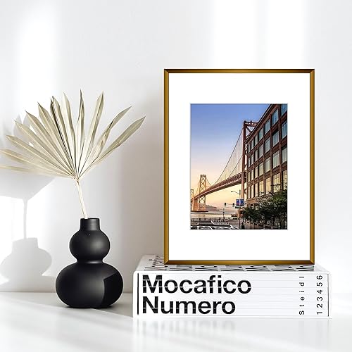 Vista 191 de Frametory - Marco de aluminio de 11 x 14 para fotos de 8 x 10 (en pulgadas), con paspartú marfil, de pared, con gancho de sierra, pestañas Bronce