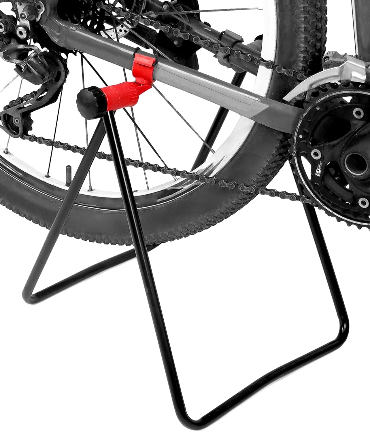 A bicycle securely mounted on the QWORK stand, viewed from the rear wheel.