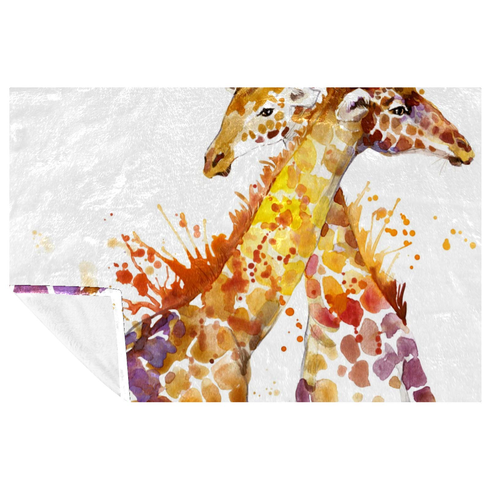 Couverture douillette girafe pour créer un nid de chaleur tendre sur votre canapé