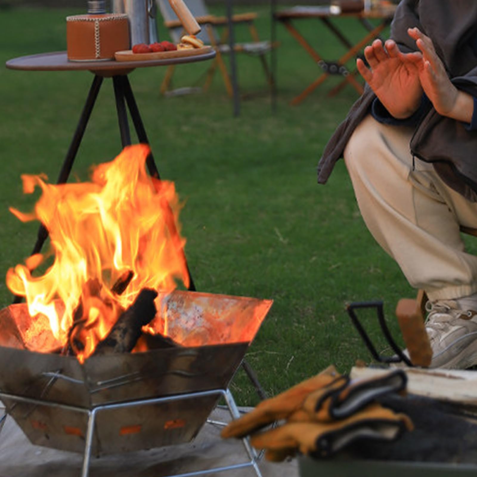 Barbecue multifunzionale esagonale trasportabile per campeggio evidenziando braciere cottura acqua bollente e capacità di grigliare barbecue all'aperto con rete