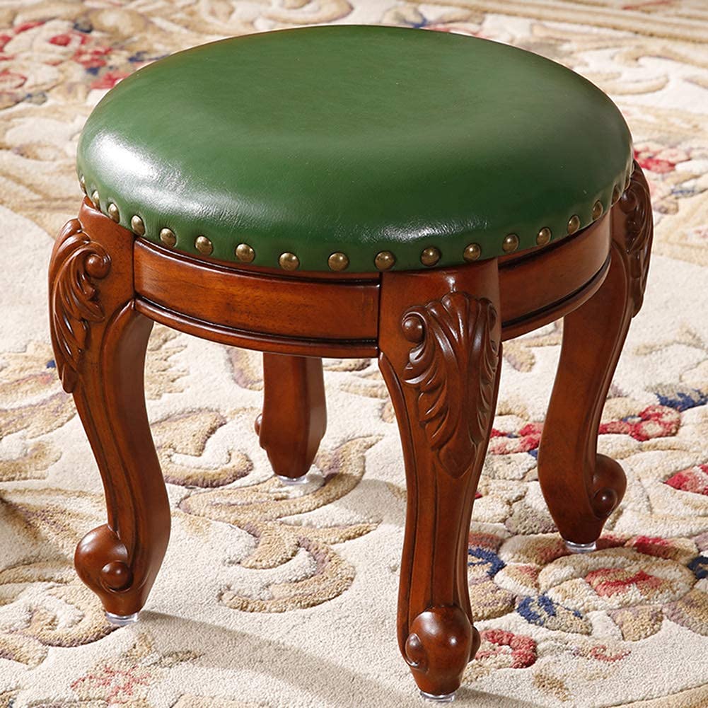 Repose-pieds ottoman vert en cuir pour coin lecture cocooning