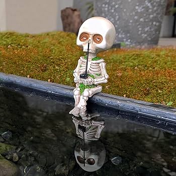 ハロウィン　骸骨　置き物 Amazon.co.jp: 樹脂製ミニチュア骸骨の置物 ハロウィンの