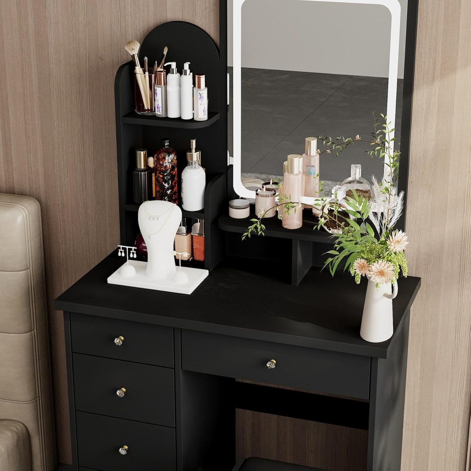 Close-up of the vanity desktop with various beauty products organized on shelves