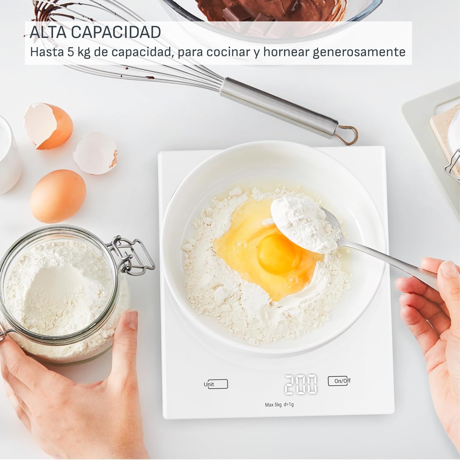 Tefal Essential Kitchen Scale weighing flour and egg in a bowl