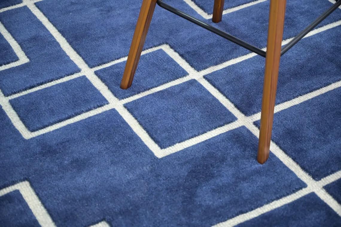Hand Tufted Navy Blue and Ivory Rectangular Wool 50 Pounds Modern Geometric Living Room Area Rug 8.0x10.0