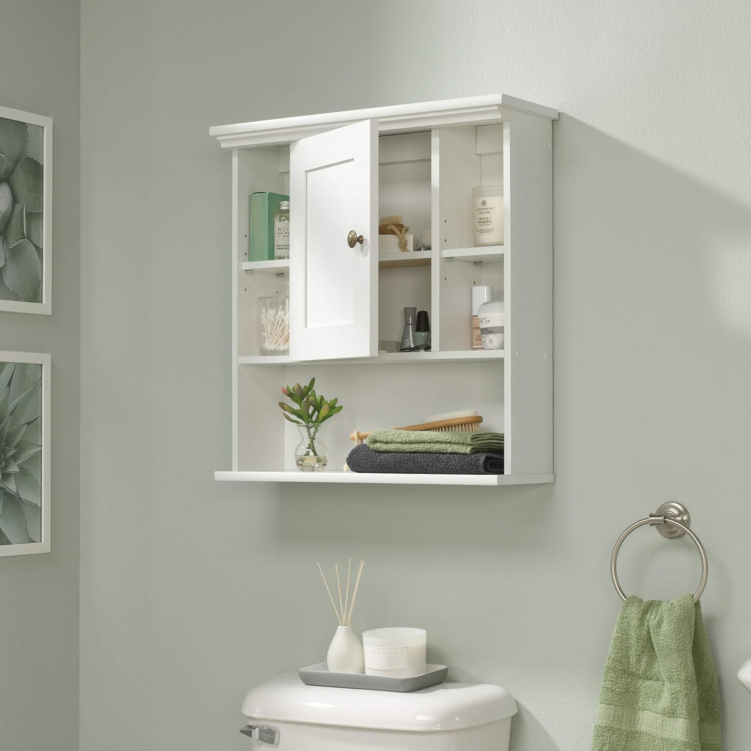 Sauder Peppercorn Wall Cabinet with door open in a bathroom
