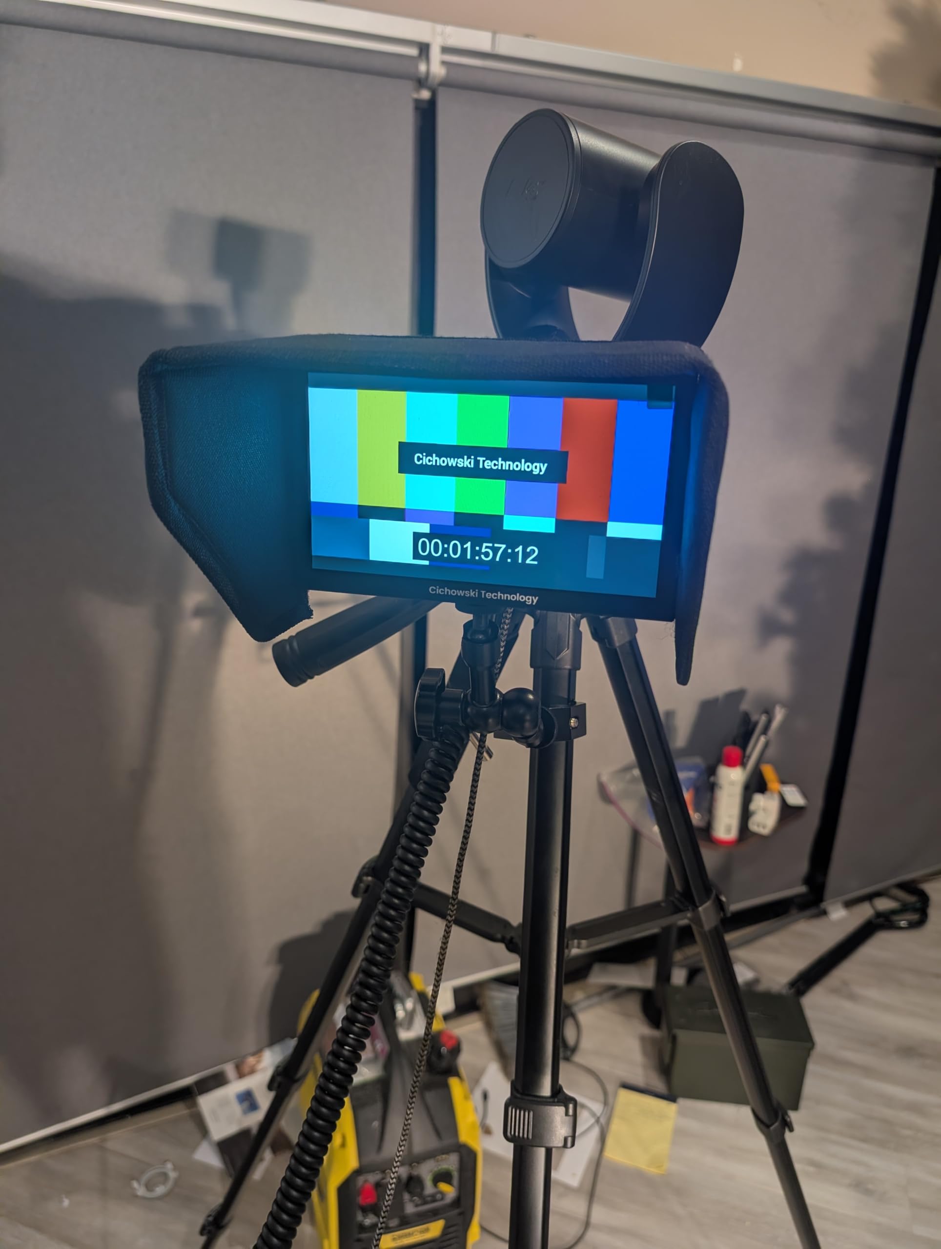 7-Inch Camera Field Monitor, 1280x600 HD Display with 4k HDMI Pass-Through, Professional Strong Fabric Sun Shade, Adjustable Clamp Mount Arm to Attach to a tri-pod 10 Foot Power Cord.