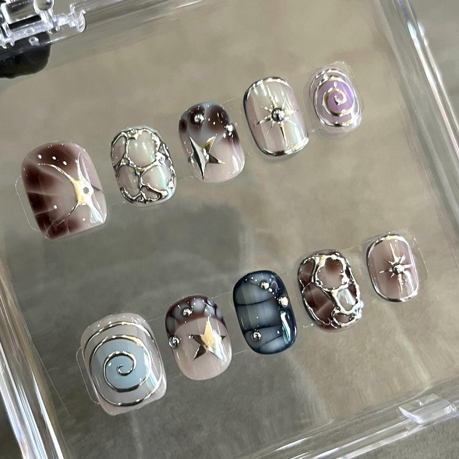 Photo 1 of 24Pcs Y2K Sweet Press on Nails Short Square Fake Nails Silver Irregular Designs French Nails Tip Stick on Nails Full Cover Artificial Glue on Nails Rhinestones Nail for Women DIY Punk Manicure
