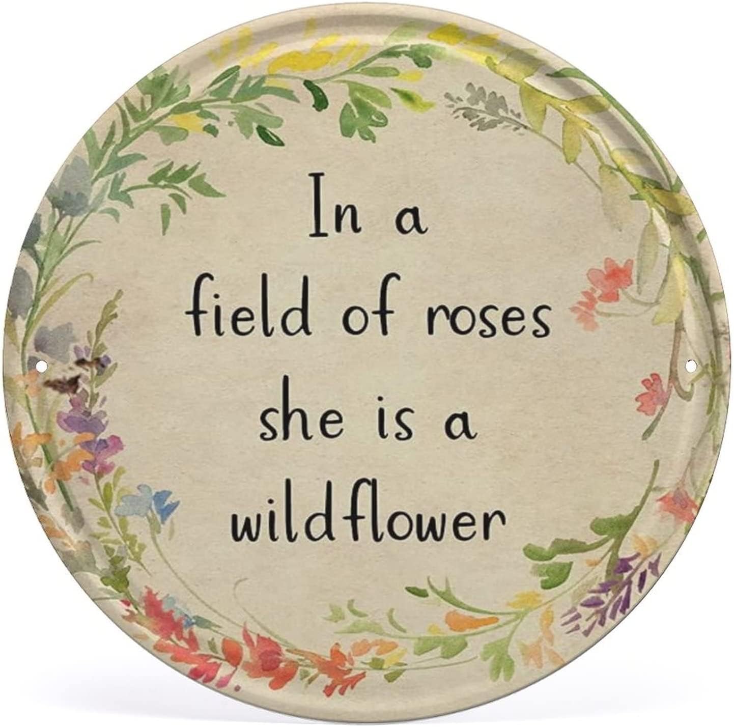 kisoyo Round Metal Tin Sign in A Field of Rose She is A Wildflower Summer Vintage Tin Signs Funny Retro Wall Art Plaque Christmas Halloween Decor for Outdoor Indoor Garage 12x12 Inch