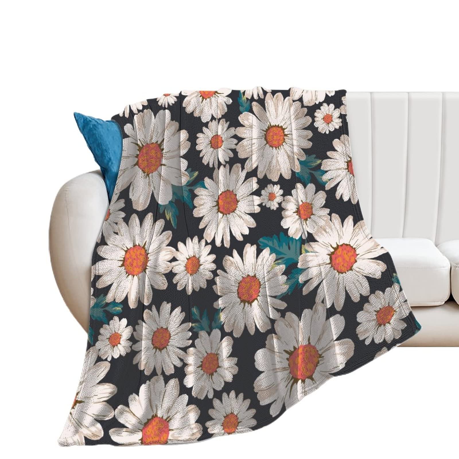 Couverture polaire marguerite pour vos soirées cocooning et moments de détente