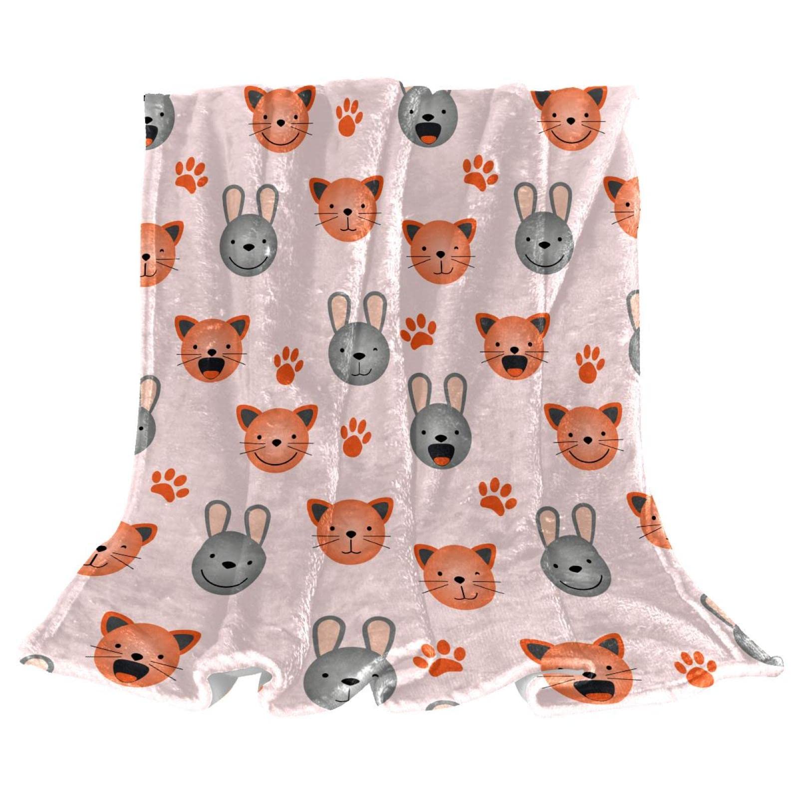 Couverture polaire anti froid pour canapé et sol motif patte
