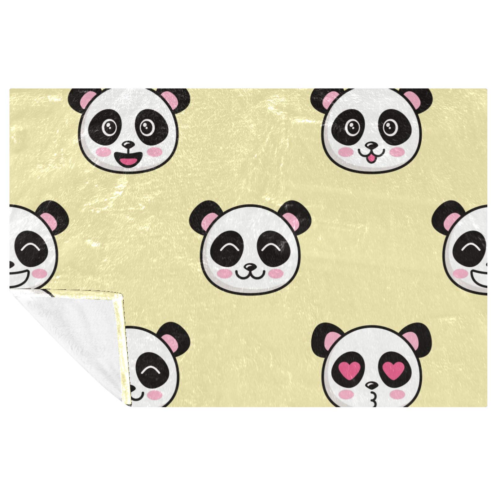 Couverture chaude panda souriant pour ne plus avoir froid sur le canapé