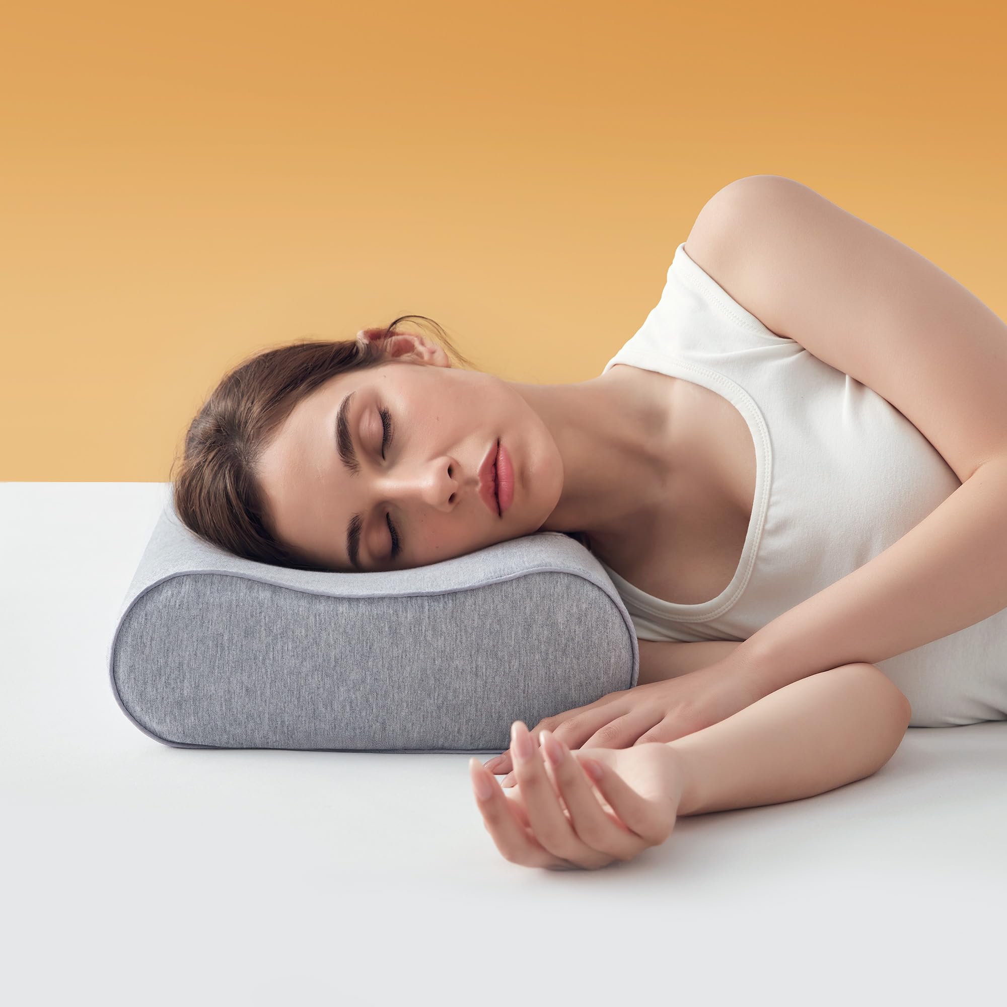 Coussin ergonomique Sonive en mousse grise pour retrouver le bonheur d'une nuit paisible