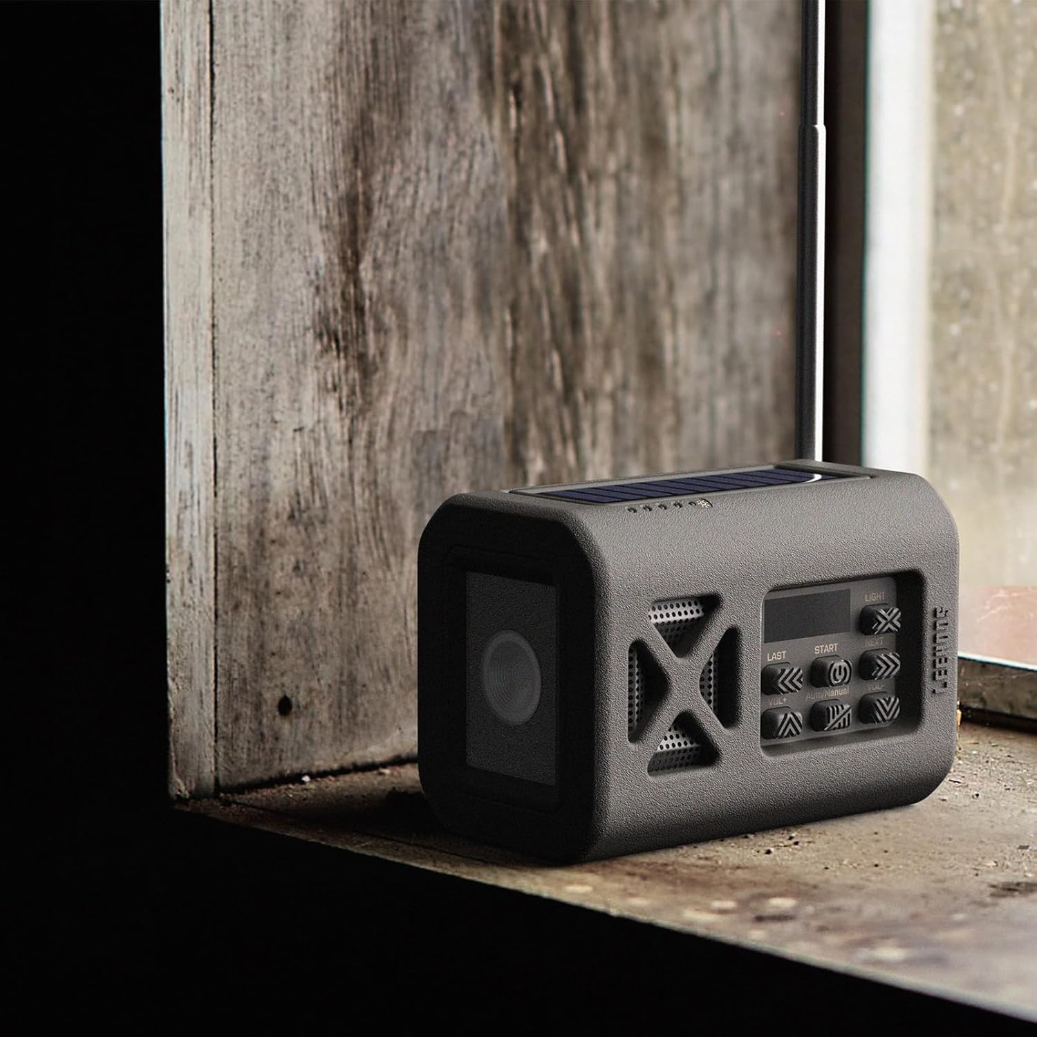 Leehoos Emergency Radio placed on a windowsill, demonstrating solar charging capability
