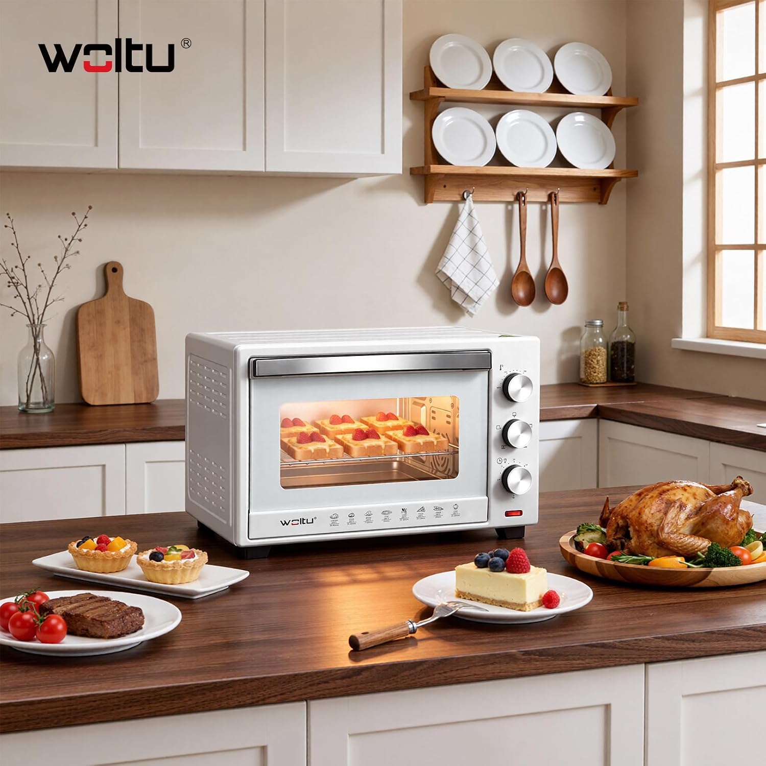 WOLTU Mini Oven in a kitchen setting with various cooked foods
