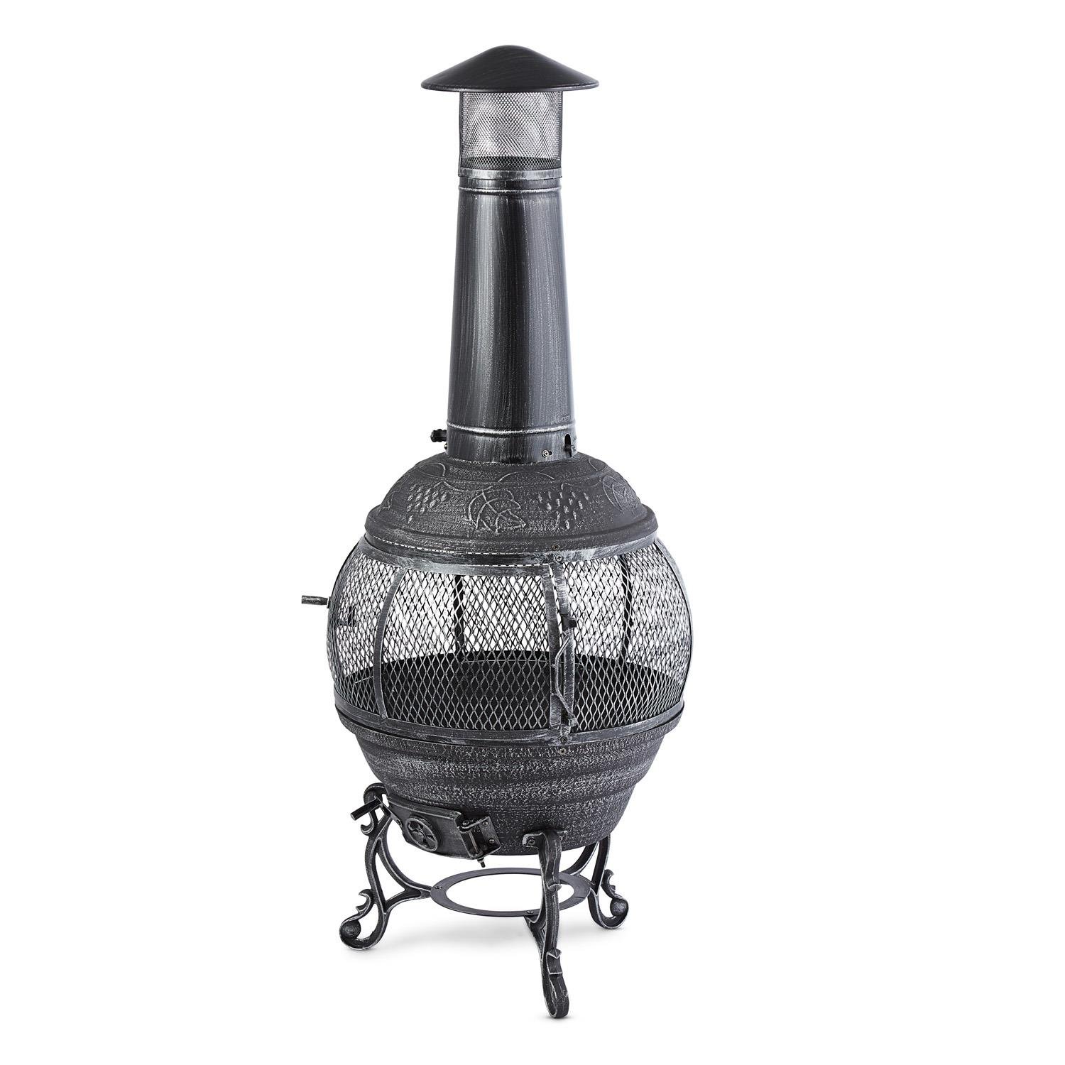 Blumfeldt Flavius - Chimenea Exterior, Hierro Fundido, 140 cm Altura, diseño Antiguo, brasero terraza Apto Carbon o leña, Fuego Circular, Incluye atizador y Parrilla, Plateado