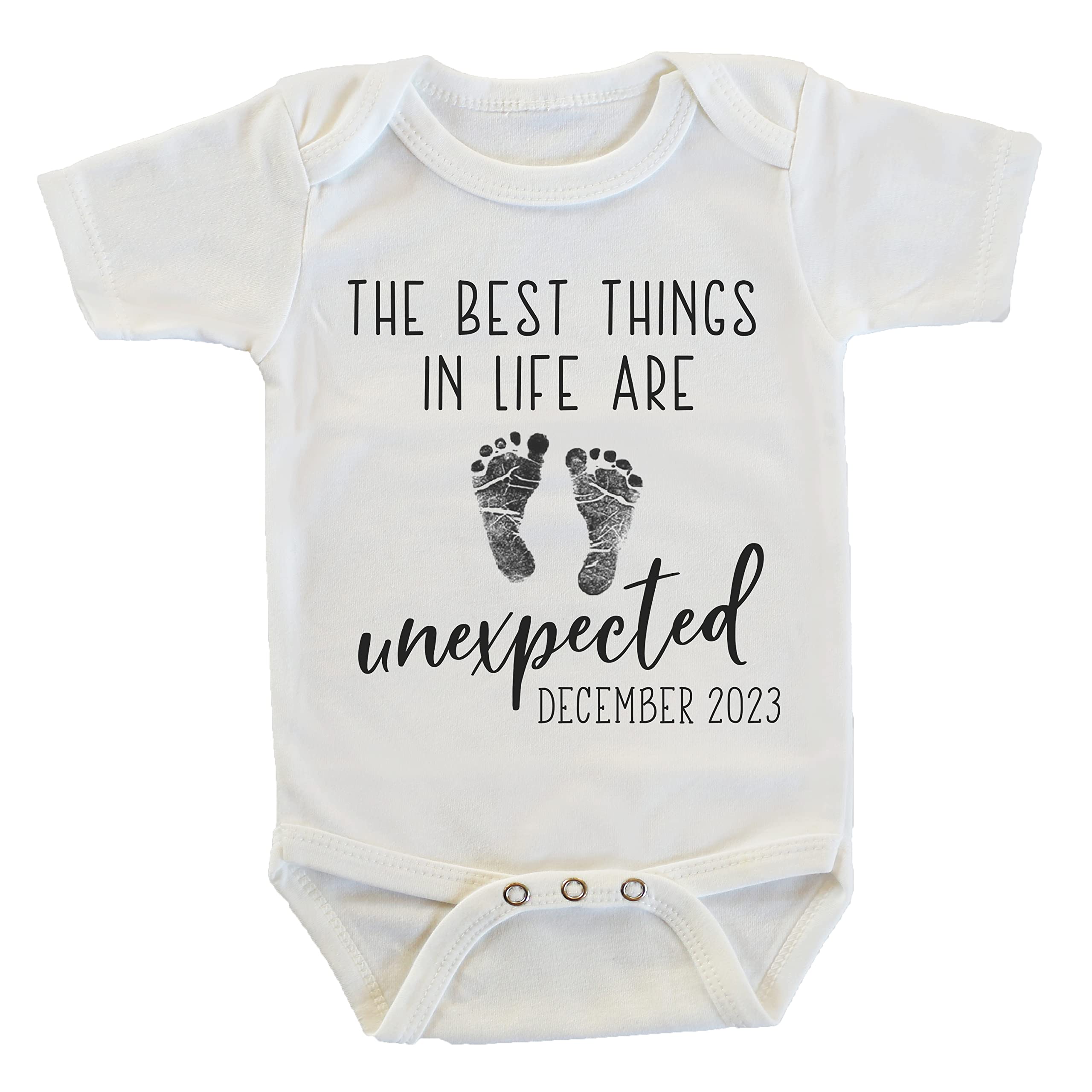 Witty and BittyThe Best Things in Life Are Unexpected Pregnancy Reveal Announcement Onesie/Bodysuit