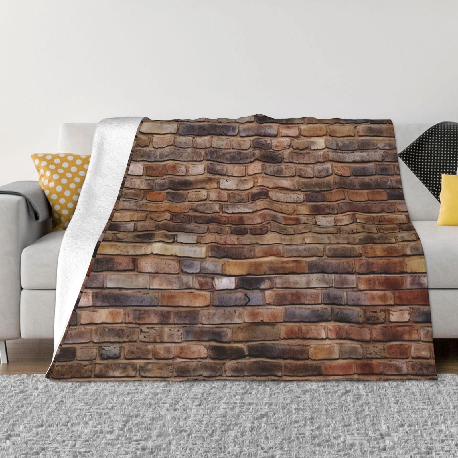 Couverture murale de brique en microfibre contre le froid de la climatisation sur canapé