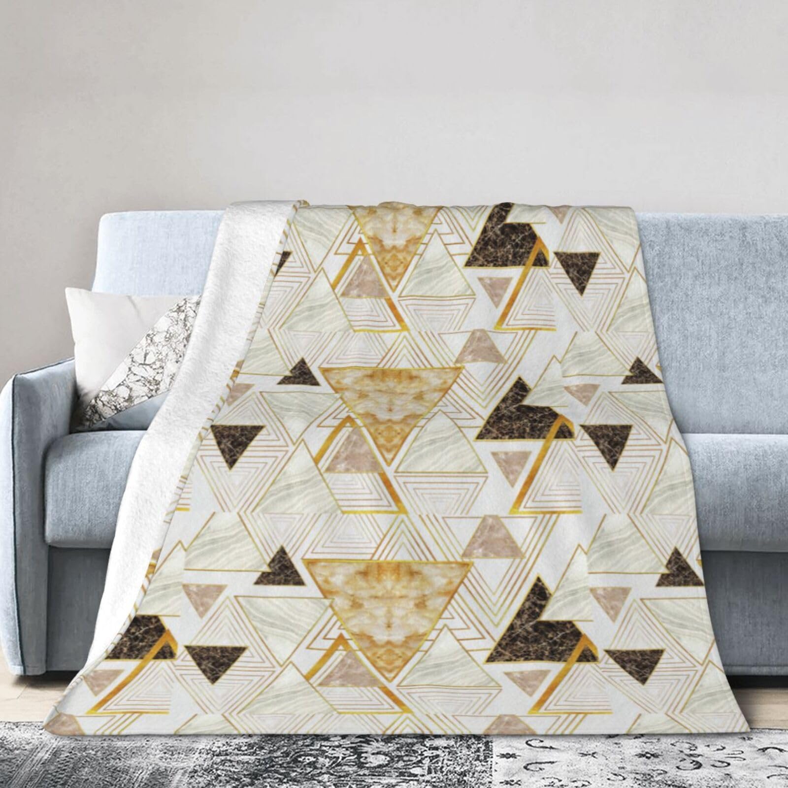 Couverture micro-polaire WURTON : le plaid design et ultra doux pour sublimer votre canapé