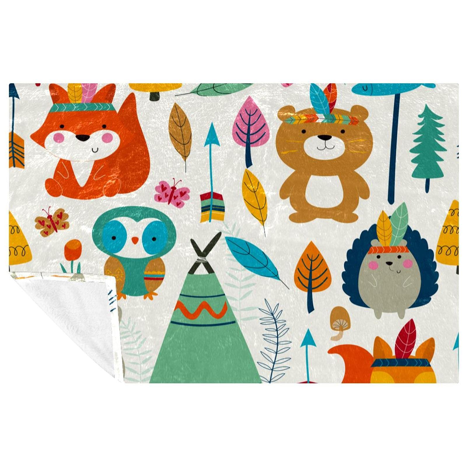 Couverture douce aux motifs tribaux pour réchauffer vos moments de complicité en famille