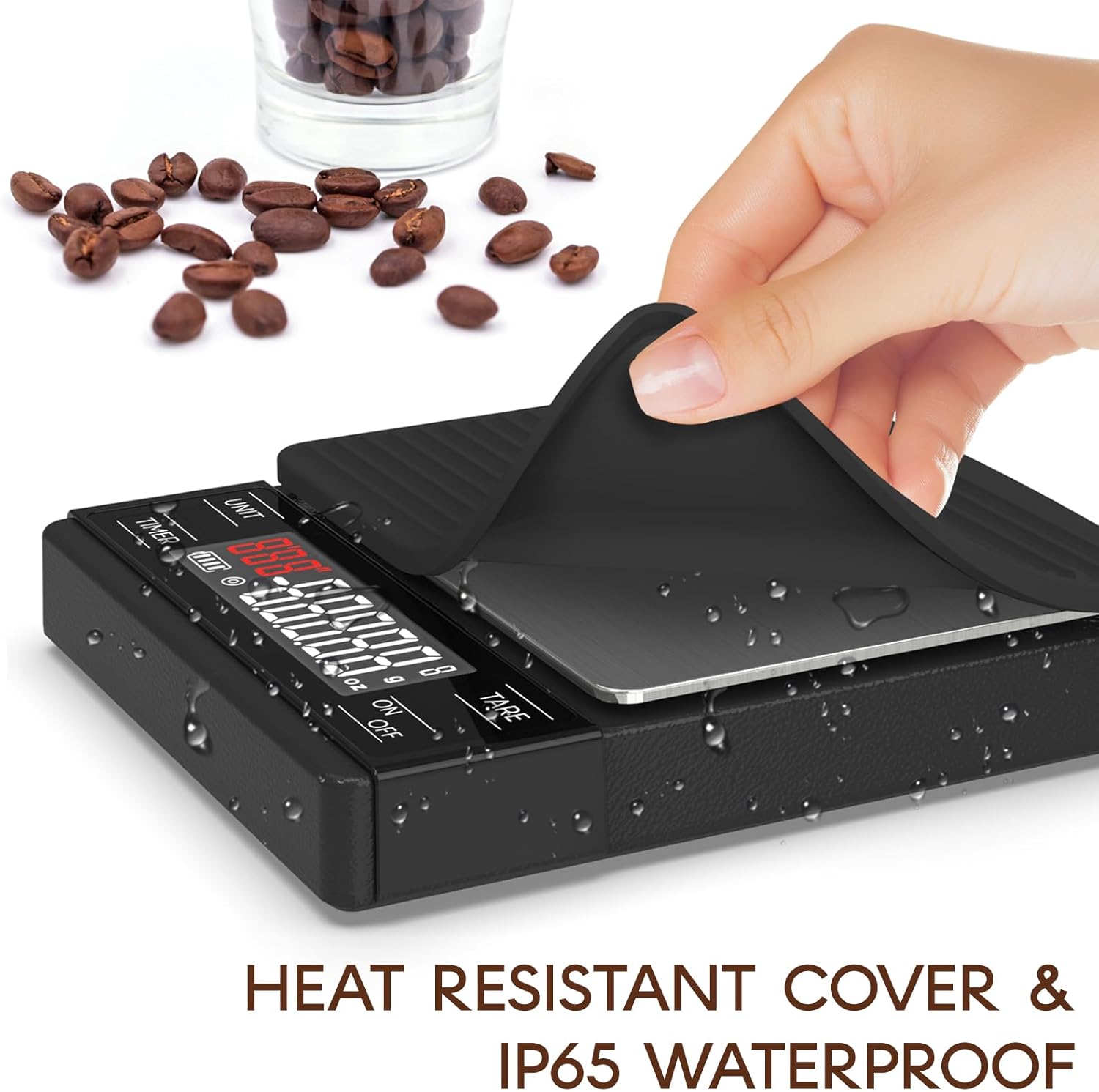 Hand lifting the heat-resistant, waterproof cover of the MAXUS Coffee Scale with water droplets on the surface