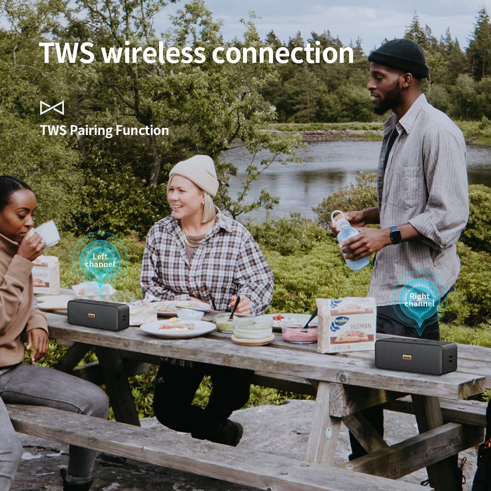 Two MLOVE S203 speakers placed on a picnic table outdoors, with text indicating 'TWS wireless connection' and 'TWS Pairing Function', illustrating stereo sound setup.