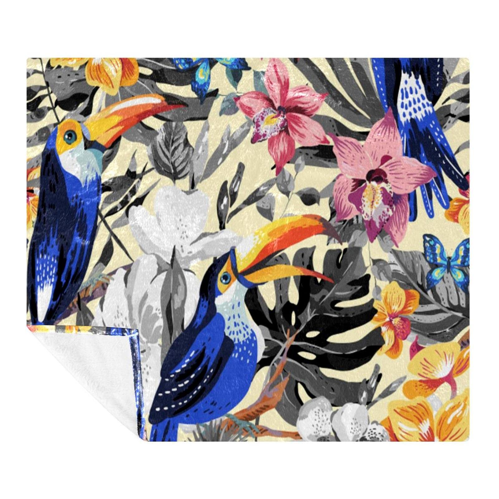Couverture polaire toucan légère pour ne plus avoir froid sur le canapé ou au lit