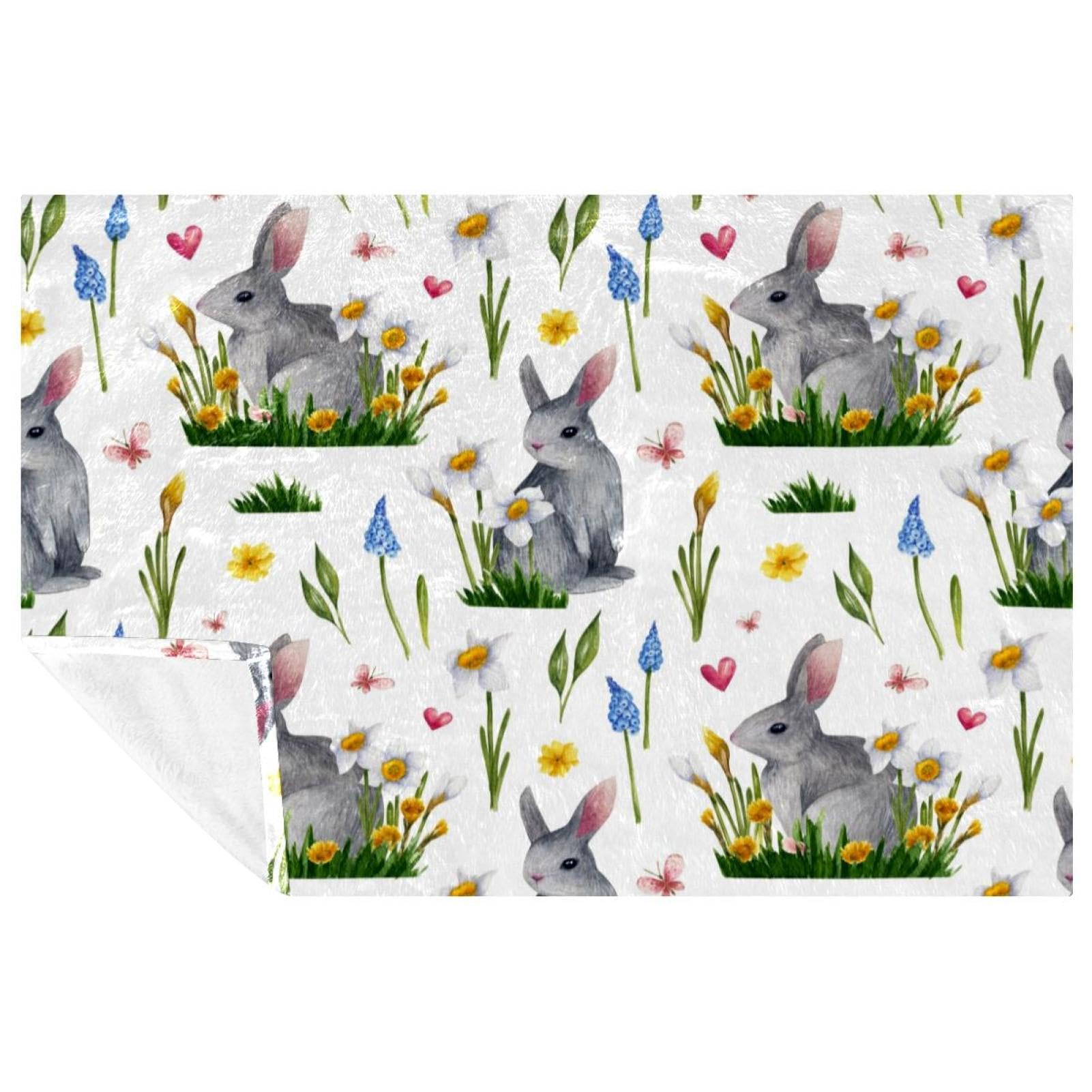 Lapin printanier solution contre le froid sur le canapé et le lit