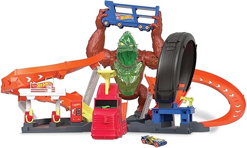 Hot Wheels Toxic Gorilla Slam - Estación de servicio y reparación de neumáticos con lanzador ajustable luces y sonidos y automóvil a escala 1 164 se