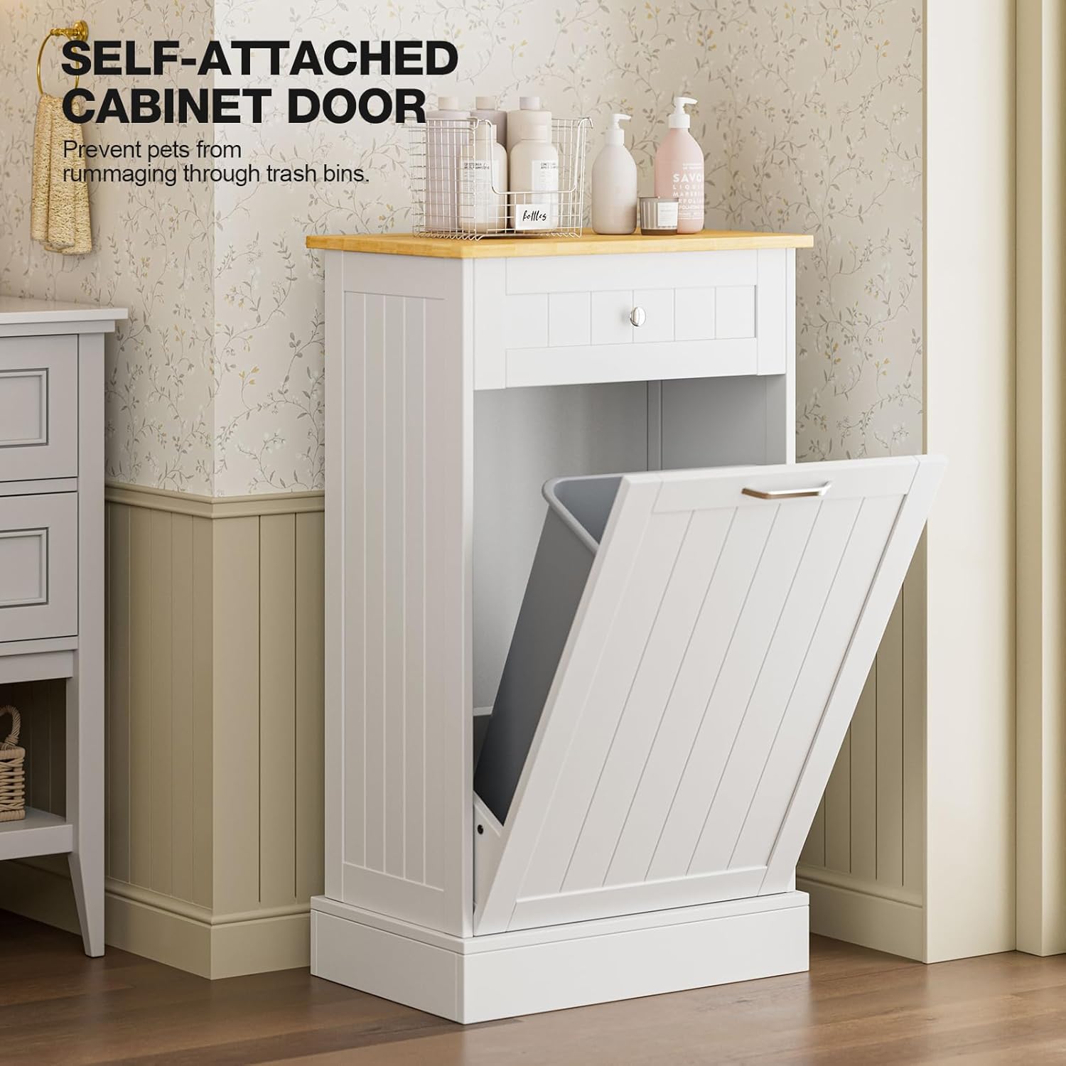Self-attached cabinet door feature of the trash cabinet