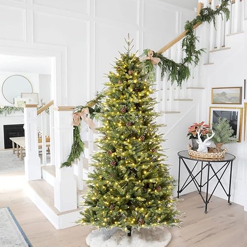 Glitzhome Árbol de Navidad artificial de abeto verde preiluminado de 7 pies con soporte de metal de fácil montaje, 9 árboles de Navidad artificiales