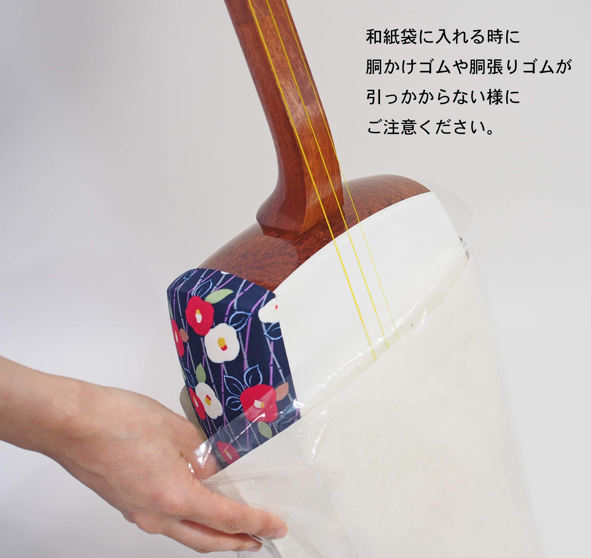 Amazon | 三味線亀屋 津軽三味線用和紙袋(ビニール付き) 1枚のお