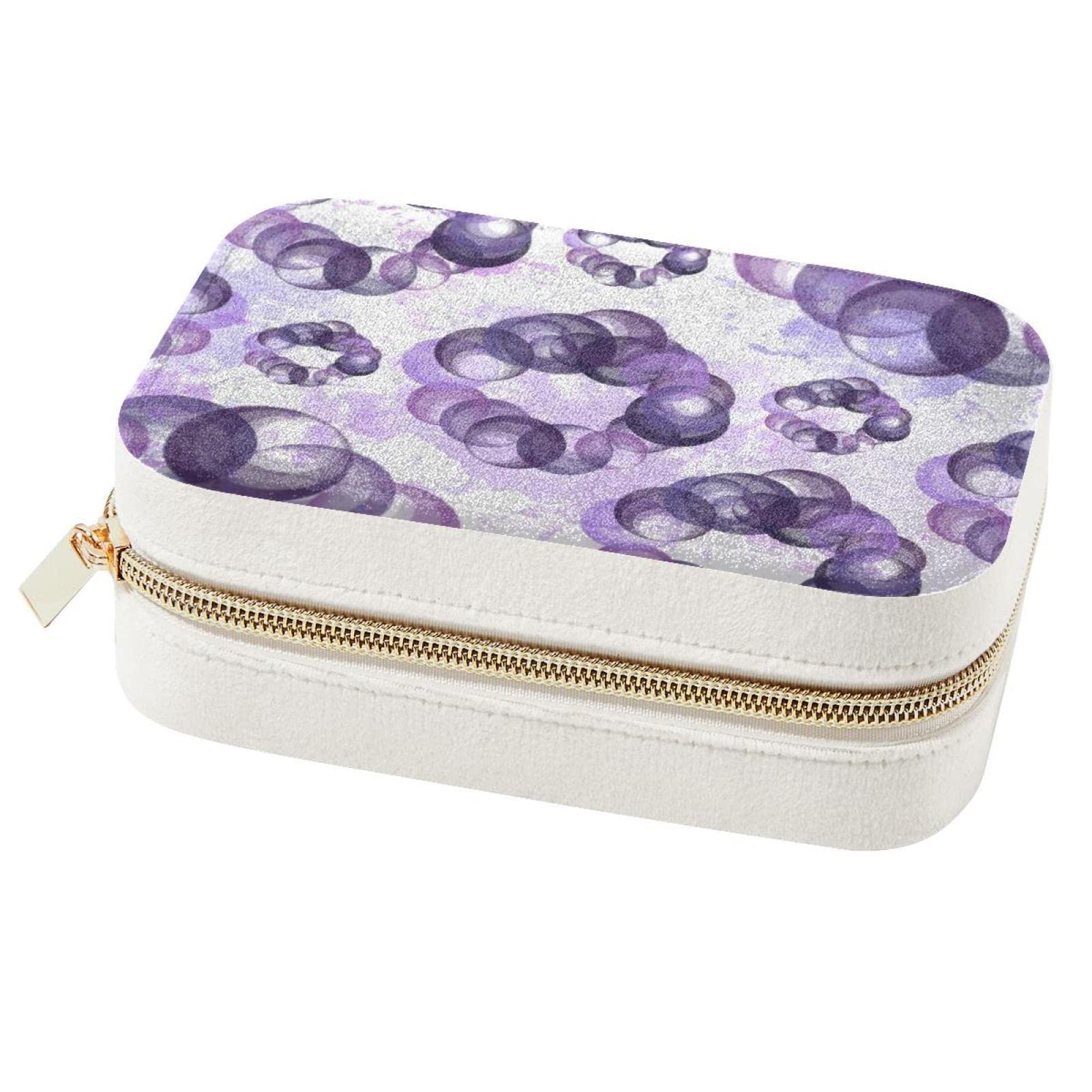 Boîte à bijoux de voyage violette avec finitions soignées pour bagues et colliers