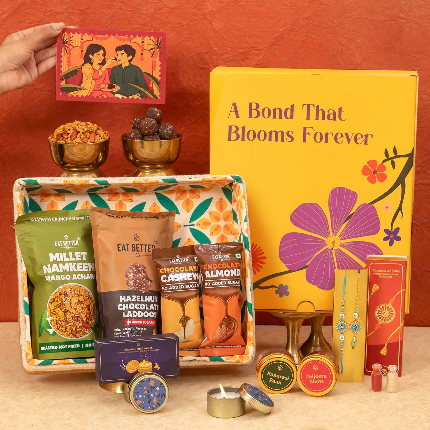 14- Item Jute Tray Rakhi Gift for Bhaiya Bhabhi – Sustainable Gift Hamper with Evil-Eye Rakhi & Bracelet – Dry-Fruit Chocolate Laddoos, Chocolate Coated Nuts, Scented Candles & Planner & more-image-23